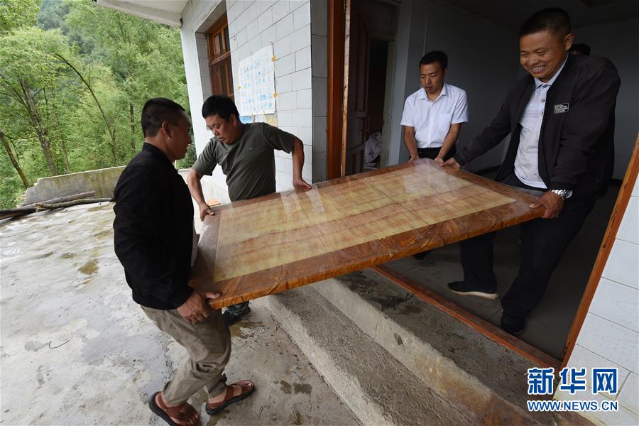 （新華全媒+）（7）千里“挪窩”，踏實開啟新生活